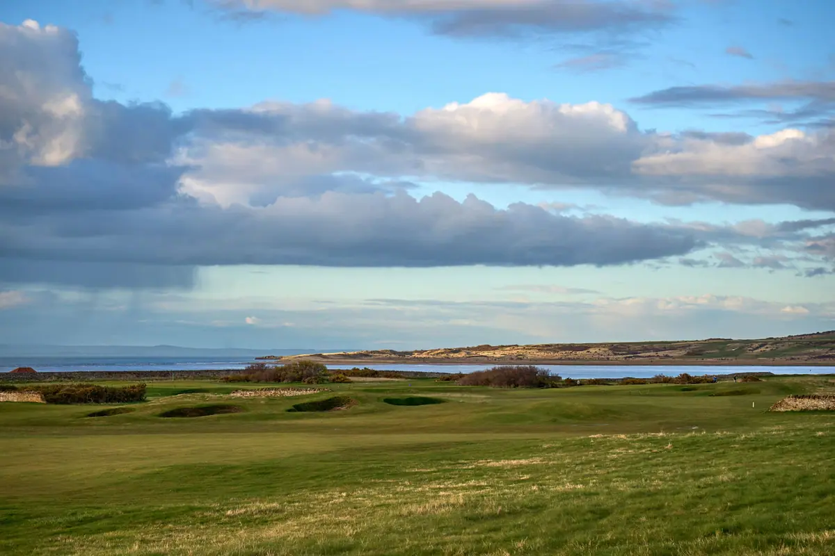 A links course along a bay