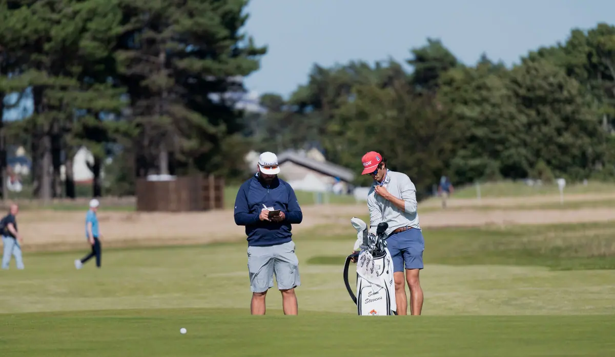 Golfers on a fairway